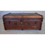 A vintage canvas and beechwood bound steamer trunk. H.37 x 80cm