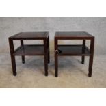 A pair of Chinese rosewood low tables on square section supports united by undertier. H.40 x 36cm