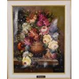 A gilt framed oil on canvas, still life flowers, signed by Omarres. H.52cm x 60cm