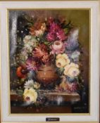 A gilt framed oil on canvas, still life flowers, signed by Omarres. H.52cm x 60cm