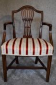 A Georgian mahogany Hepplewhite style open armchair. H.90 x 60cm