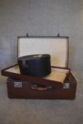 A vintage suitcase with lift out tray, a hat box and a small vintage attache case. H.26 x 68cm