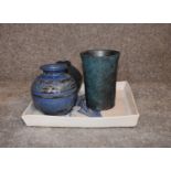 Three art pottery vases and an art pottery platter with blue glazed floral decoration. Tallest H. cm