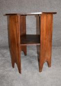 An Arts and Crafts mahogany octagonal occasional table. H.70 x 65cm