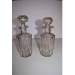 A pair of Georgian cut glass decanters. H.23cm