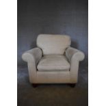 A Laura Ashley armchair upholstered in beige fabric. H. 86 x 90 x 86cm