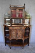 A Victorian rosewood and satinwood inlaid chiffonier with bevelled mirror glass superstructure above