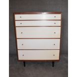A 1970's vintage chest of five long drawers on splay feet. H.120 x 91cm