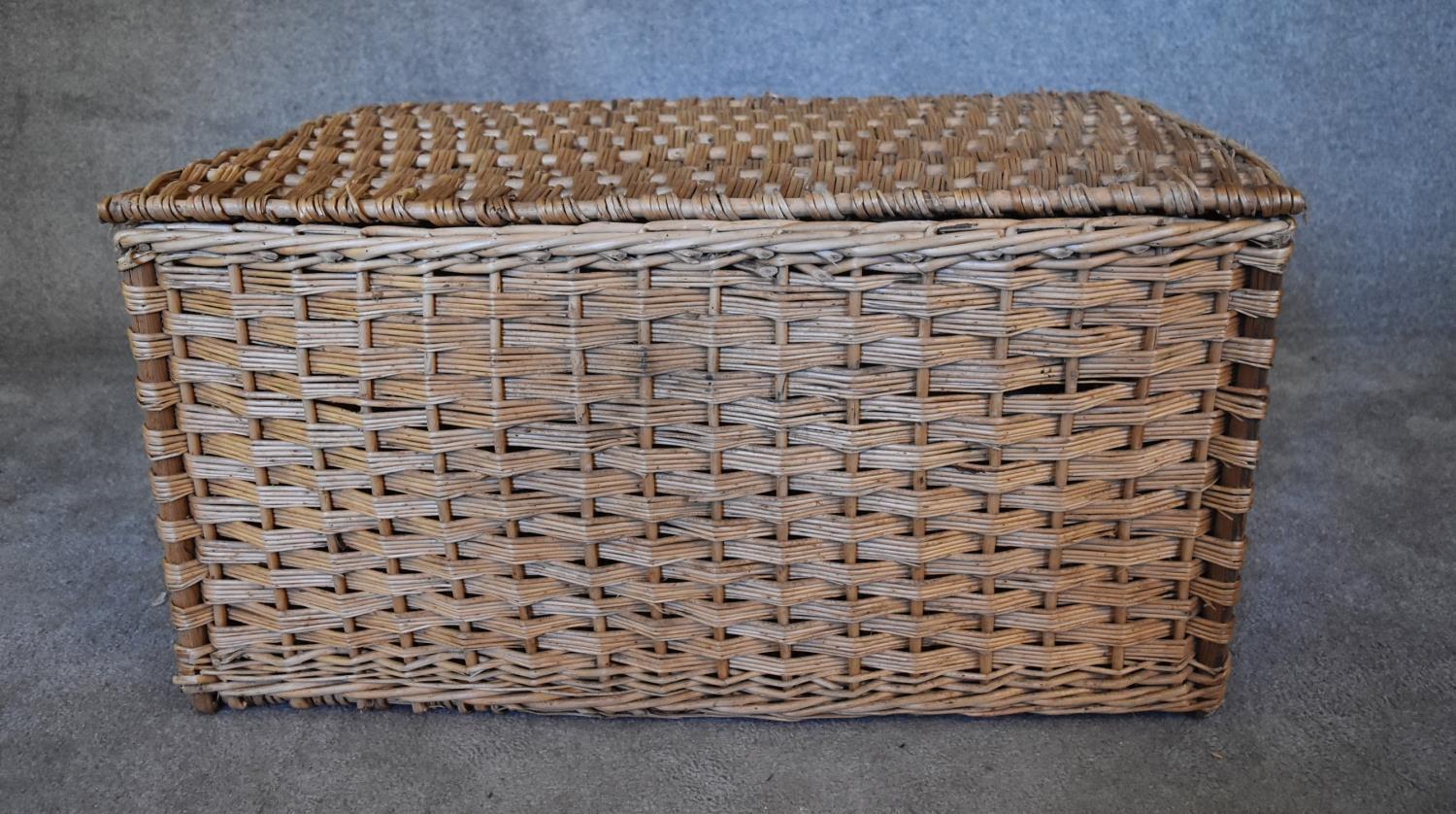 A large vintage wicker basket or food hamper. H.48 x 90 x 60cm