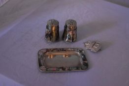 A collection of silver and white metal iterms items, to include matching Mexican white metal salt