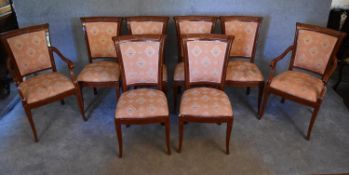 A set of eight Empire style dining chairs with label to underside signed 'Ceraciones Ropesa S.L.