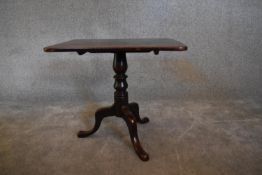 A 19th century mahogany tea table on tripod base with cabriole supports. H.52 x 59cm