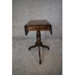 A small Regency mahogany drop flap table fitted frieze drawer opposing dummy drawer on tripod