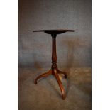 A 19th century mahogany circular topped tripod table. H.74cm W.49cm