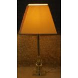 A vintage clear lead crystal faceted stemmed lamp on a square base. H.57cm