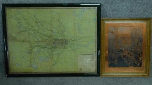 A framed and glazed vintage tube and train map of London and a framed copper plate engraving after