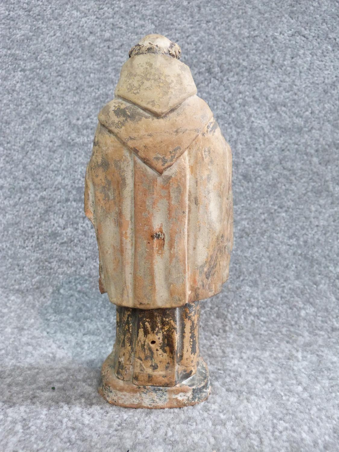 Two antique painted terracotta figures. One of a monk holding a candle and a bible and the other - Image 11 of 14