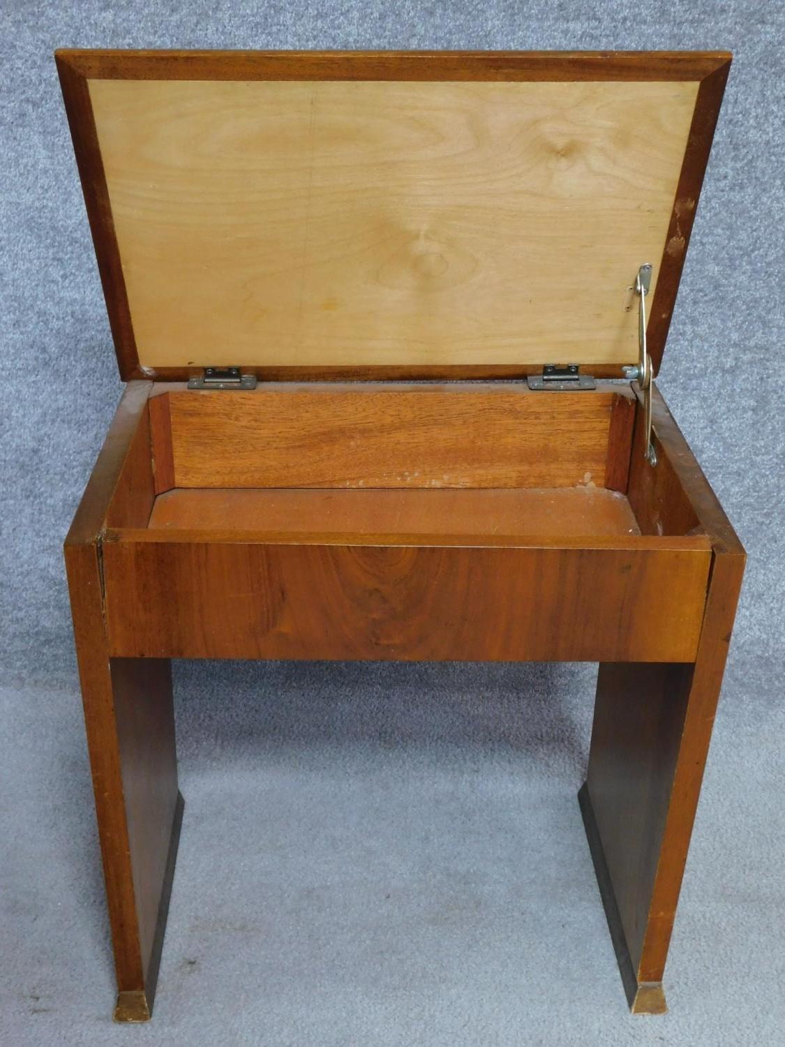 An Art Deco figured walnut piano stool with hinged lift up top enclosing sheet music compartment. - Image 3 of 5