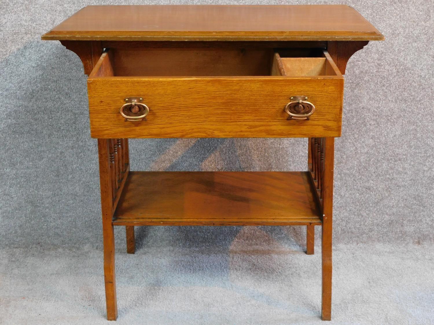 An Arts and Crafts oak hall table with frieze drawer and under tier, raised on square supports. H.75 - Image 3 of 5