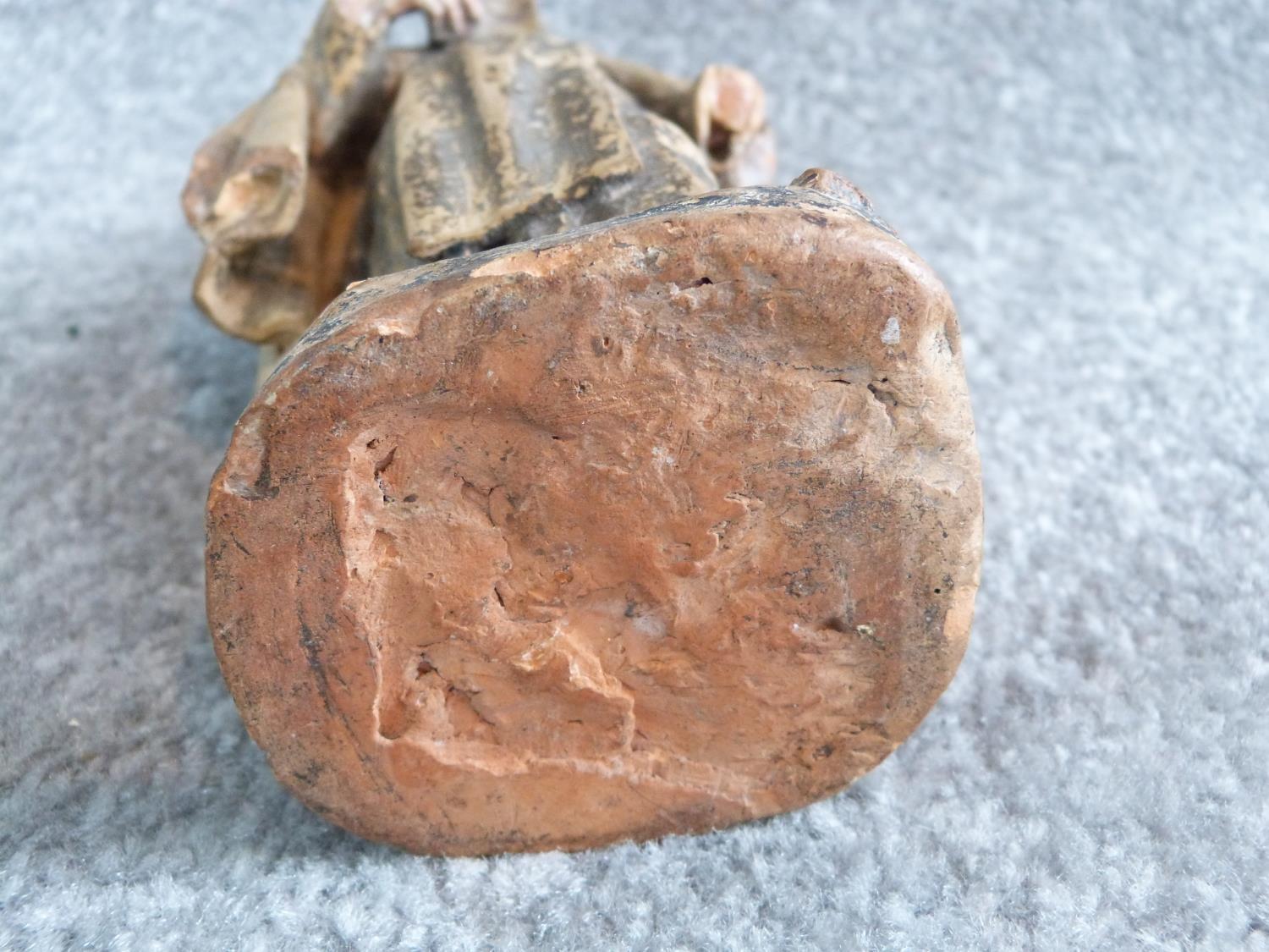 Two antique painted terracotta figures. One of a monk holding a candle and a bible and the other - Image 12 of 14