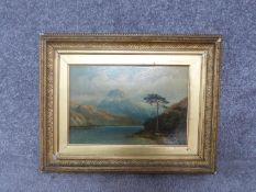 A giltwood framed 19th century oil on panel of Loch Loman, 1866. Signed Tnai H Hair to reverse.