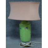 A Chinese hand painted table lamp with dual bulb fitting. H.55cm
