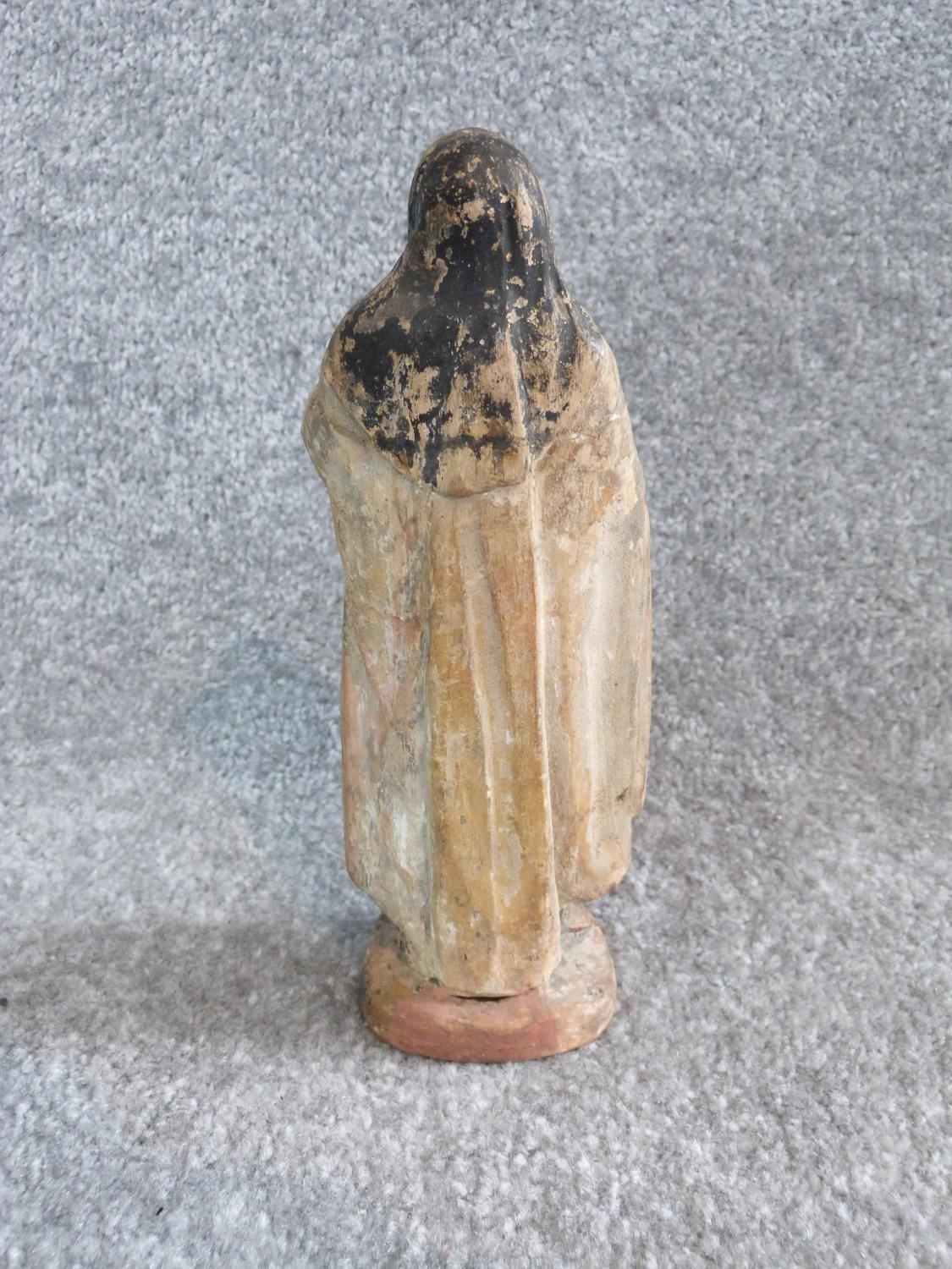 Two antique painted terracotta figures. One of a monk holding a candle and a bible and the other - Image 4 of 14