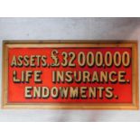 A framed vintage mirrored advertising sign for life insurance endowments. 136x69cm