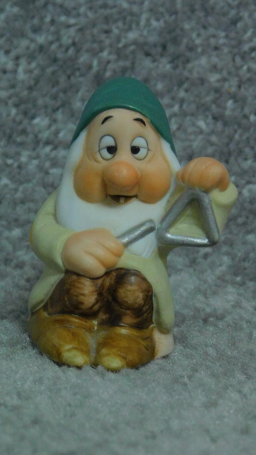 A collection of porcelain hand painted figures of Snow White and the seven dwarves by Schmid for The - Image 2 of 10