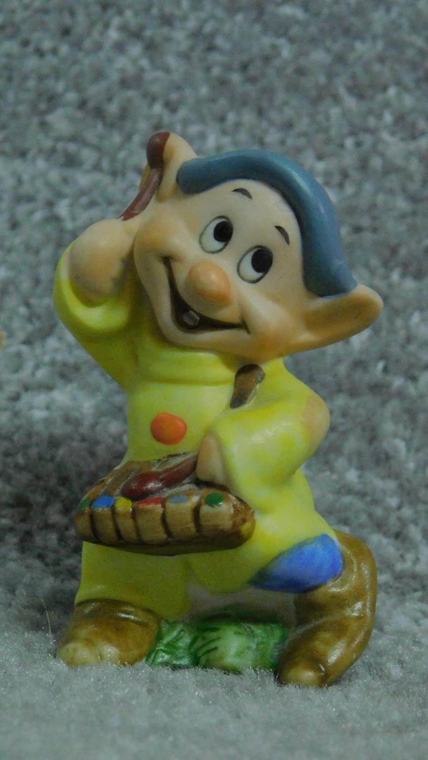 A collection of porcelain hand painted figures of Snow White and the seven dwarves by Schmid for The - Image 6 of 10
