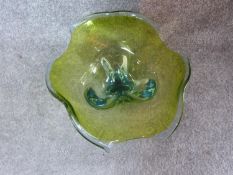 A vintage possibly Murano art glass bowl. With blue and green cased glass. Polished base. Diameter