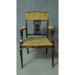 A late Victorian mahogany and satinwood inlaid armchair with urn design to the back, floral