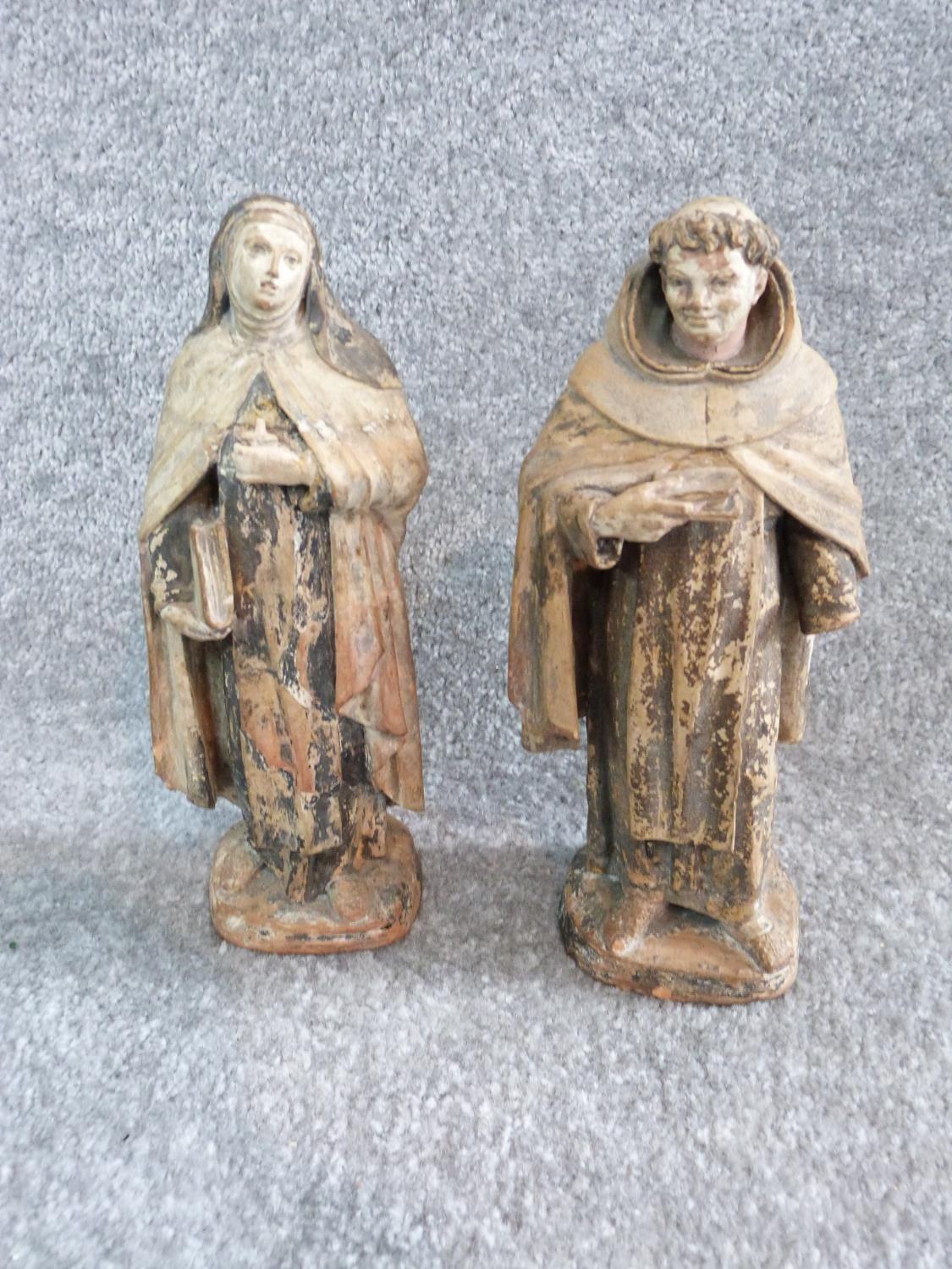 Two antique painted terracotta figures. One of a monk holding a candle and a bible and the other - Image 2 of 14