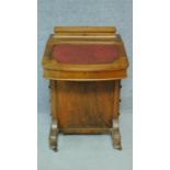 A Victorian burr walnut and satinwood Arabesque inlaid Davenport fitted with four drawers opposing