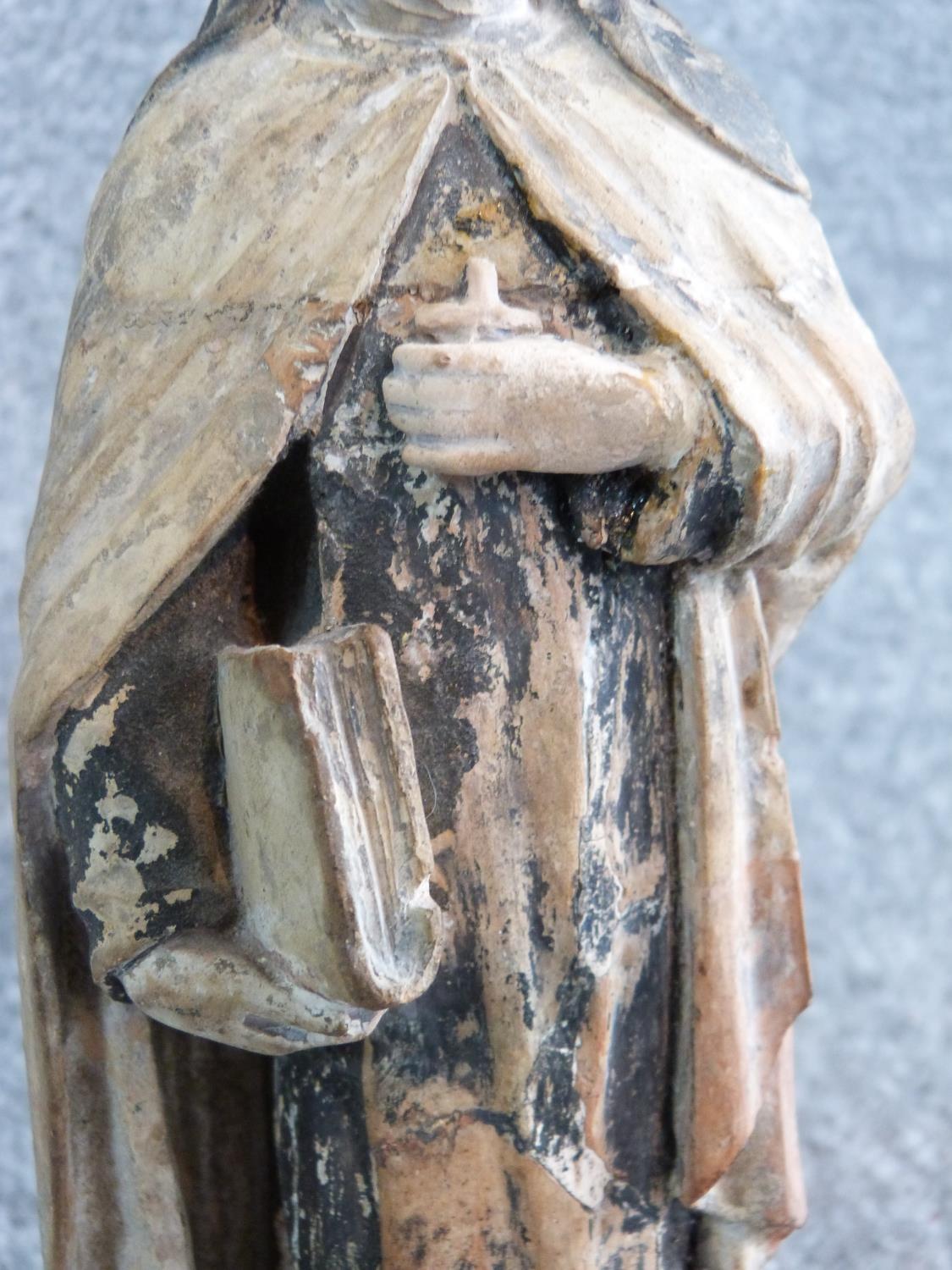 Two antique painted terracotta figures. One of a monk holding a candle and a bible and the other - Image 6 of 14