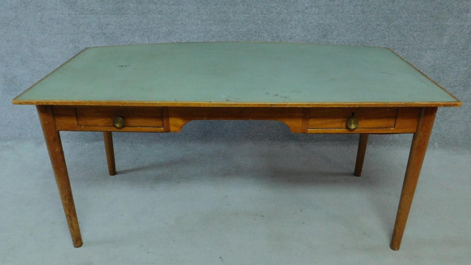 A mid 20th century teak writing table fitted inset tooled pale green leather top with two frieze - Image 2 of 8