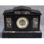 A Victorian style black slate and marble mantle clock. With white enamel and brass dial. Engraved