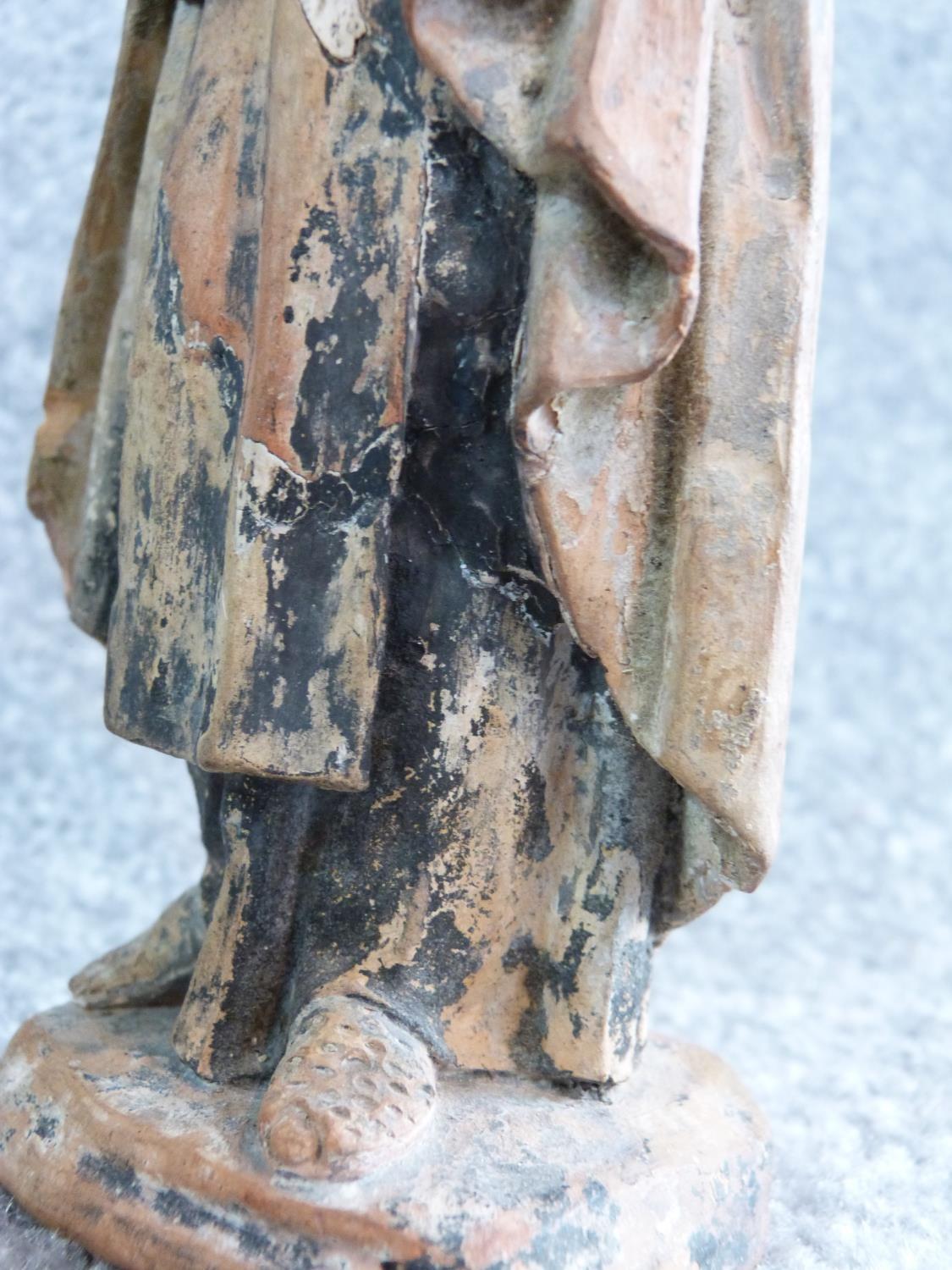 Two antique painted terracotta figures. One of a monk holding a candle and a bible and the other - Image 8 of 14