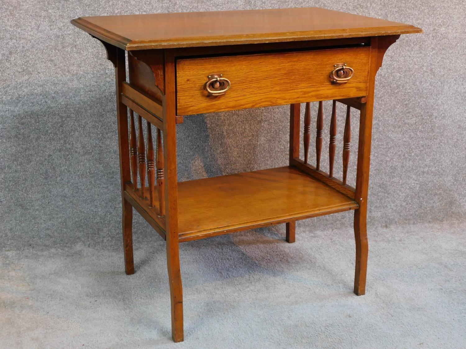 An Arts and Crafts oak hall table with frieze drawer and under tier, raised on square supports. H.75 - Image 2 of 5