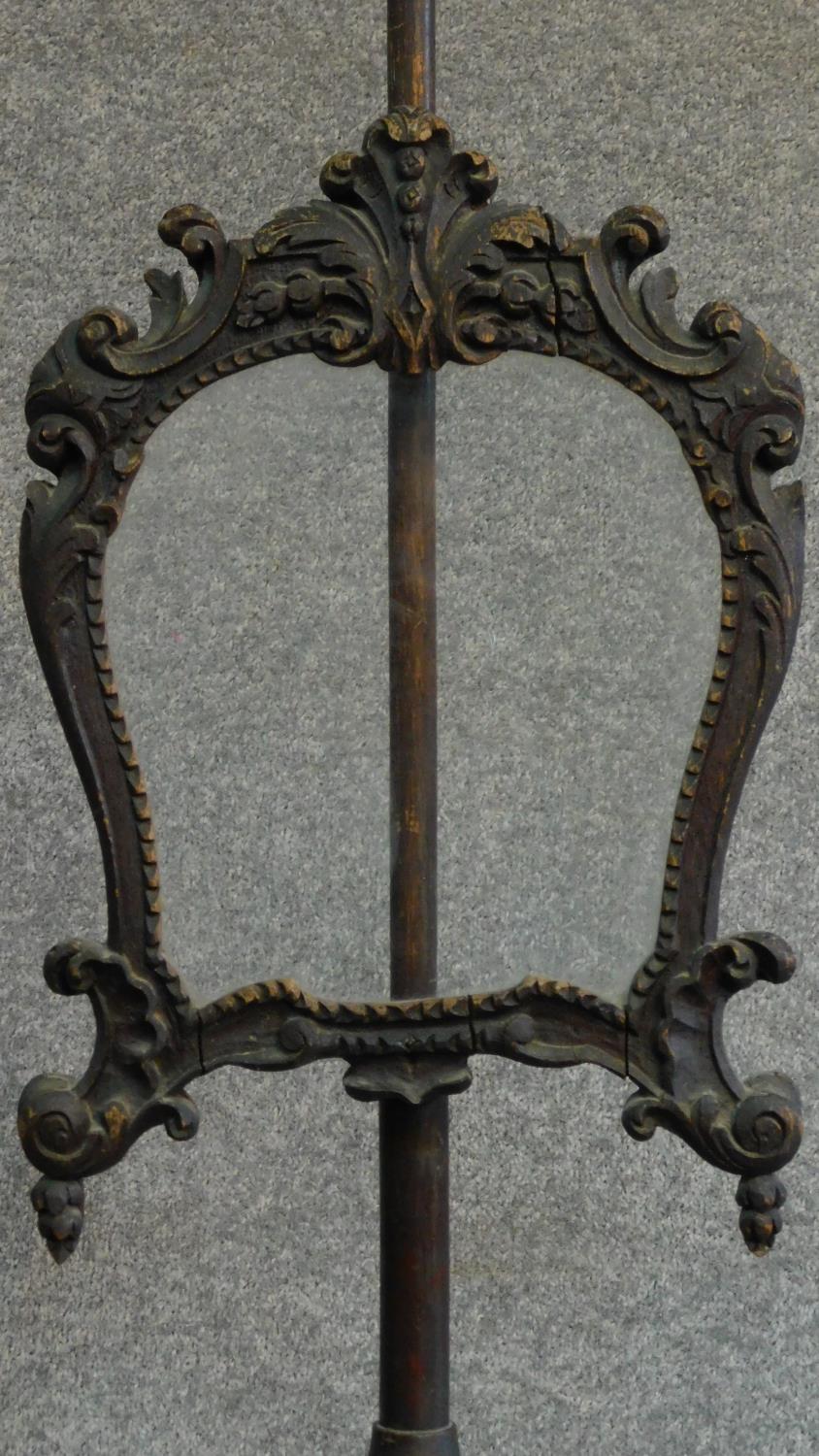 A carved oak Victorian pole screen on naturalistic base, fitted glazed panel. H.158cm - Image 3 of 6