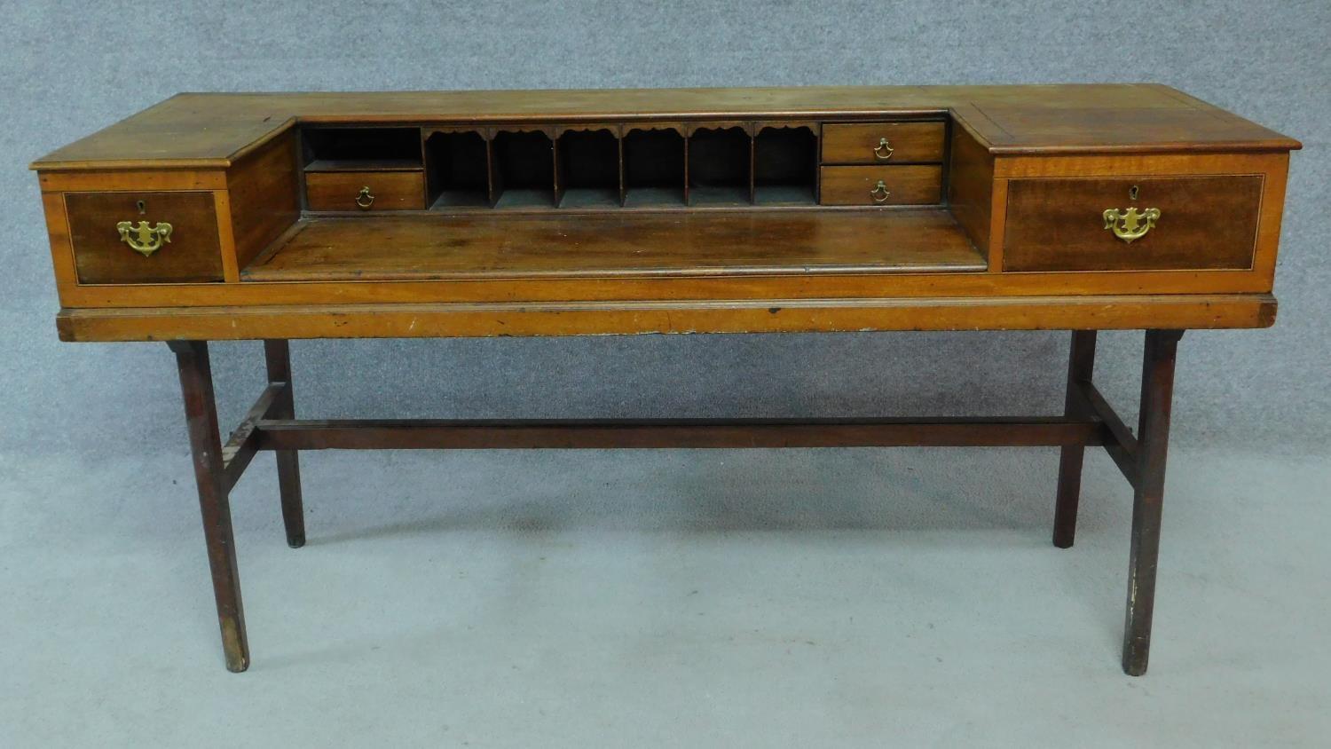 An early 20th century mahogany converted piano writing desk raised on stretchered square supports. - Image 2 of 6