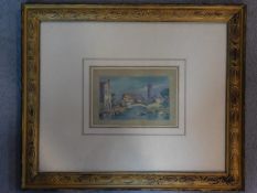 A giltwood framed and glazed watercolour depicting a townscape with a bridge over a river. 59x49cm