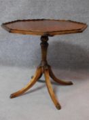 A Victorian mahogany tilt top occasional table, raised on tripod swept supports. H.57 W.61cm