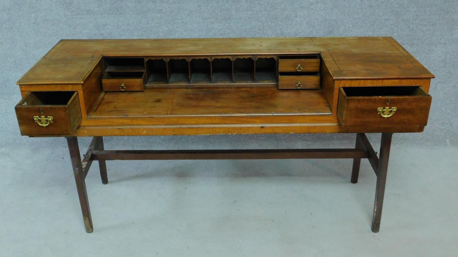 An early 20th century mahogany converted piano writing desk raised on stretchered square supports. - Image 3 of 6