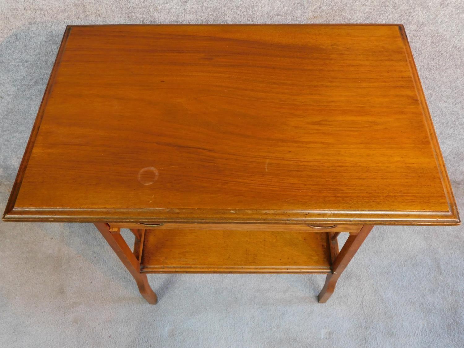 An Arts and Crafts oak hall table with frieze drawer and under tier, raised on square supports. H.75 - Image 4 of 5