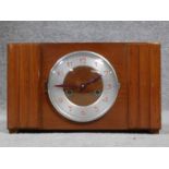A vibtage oak and metal mantle clock. Red painted numerals. H.22 W.37 D.13cm