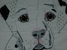 A embroidery and applique by Frances Stokes, depicting a dalmation puppy. Signed by artist. H.84xW.
