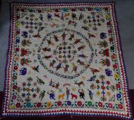 An Indian wall hanging, hand embroidered with Gods, figures, deer, birds, elephants and Om