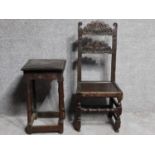 An antique style country oak carved armchair together with a similar side table. H.108cm