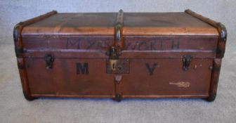 A vintage canvas and beechwood bound steamer trunk. H.37 x 80cm